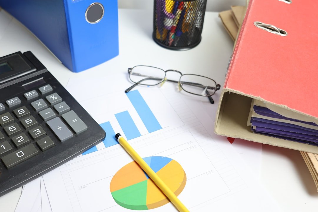 Accounts receivable month-end close with calculator, charts and finance documents